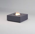 Square fire pit table with flames on a gray background