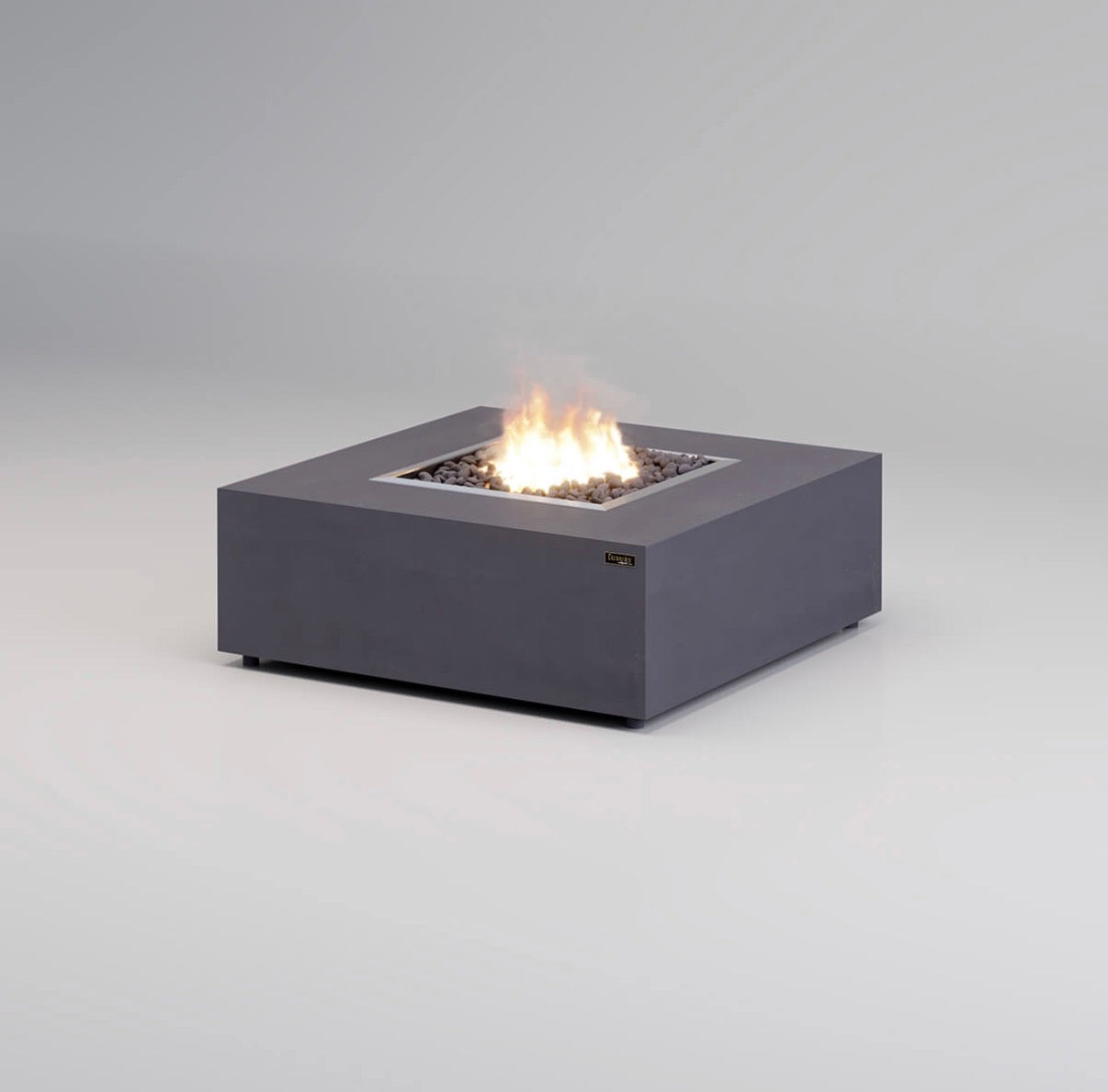 Square fire pit table with flames on a gray background